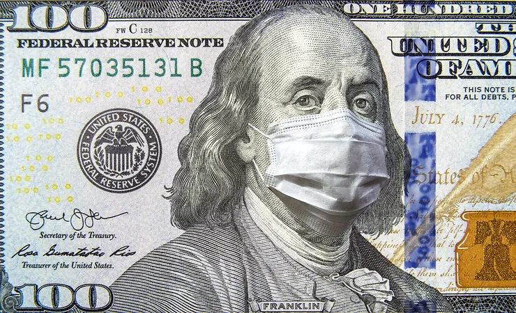 A U.S. 100-dollar bill featuring Benjamin Franklin wearing a white medical mask.